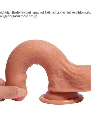 Dual Layer Silicone Dildo in realistic skin tone with textured shaft, curved arch and suction cup base
