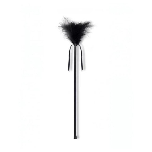 Close-up of elegant black feather stimulator with ultra-soft feathers for sensory pleasure