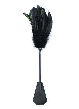 Feather Tickler and Paddle in black, with a soft feather plume, slim handle and faceted paddle-shaped base