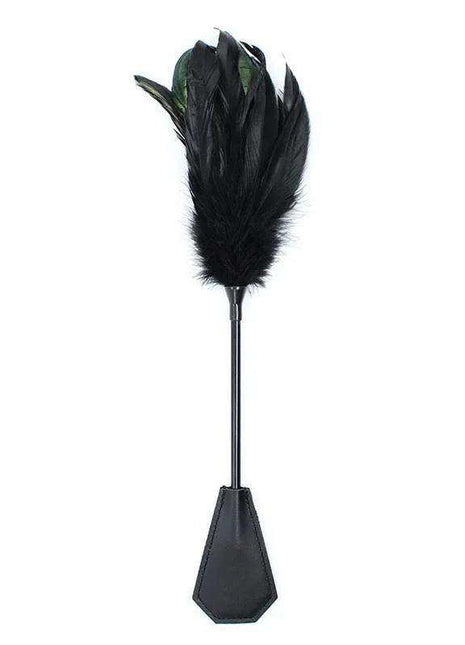 Feather Tickler and Paddle in black, with a soft feather plume, slim handle and faceted paddle-shaped base