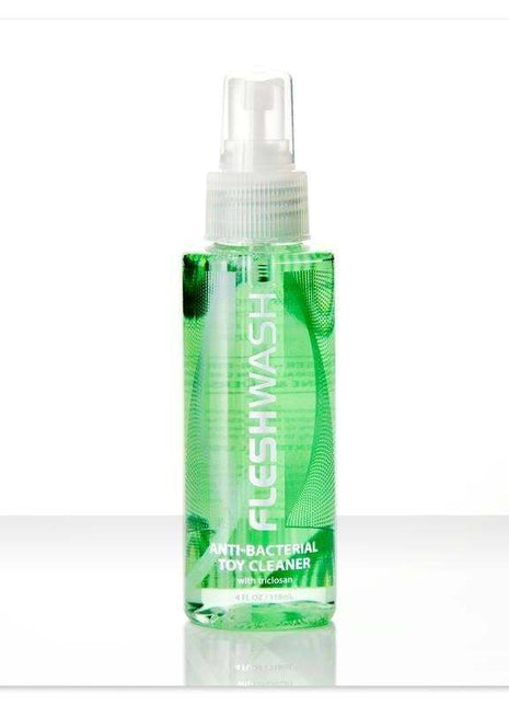 Fleshlight Toy Cleaner in a clear green spray bottle with white pump, antibacterial label and 100 ml capacity