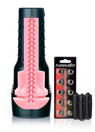 Fleshlight Vibro-Pink Lady Touch sleeve with a black casing, pink textured interior, and included vibration bullets and batteries