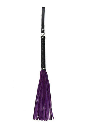 Flogger Purple 35 cm with a black textured handle and wrist loop, silver hardware, and long purple tassels.