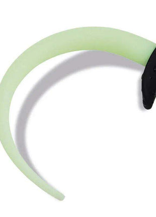 Glow in the Dark dog tail butt plug with a pale green curved tail attached to a black base
