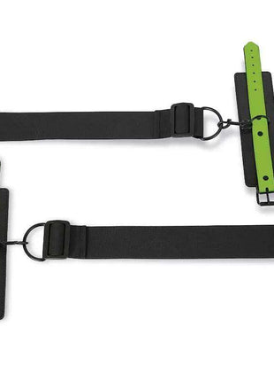 Glow in the Dark Door Restraints with black adjustable straps, bright green perforated cuffs and metal rings