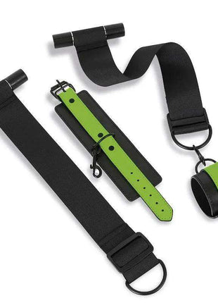 Glow in the Dark Door Restraints with black fabric door straps and bright green adjustable cuffs with metal rings