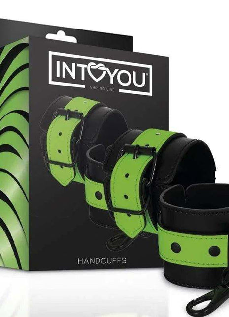 Glow in the Dark Handcuffs with black cuffs and bright green straps, featuring metal buckles and connecting clips