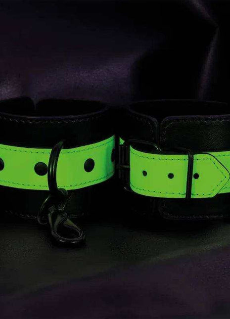 Glow in the Dark Handcuffs with bright green glowing bands, black trim, stud details and a metal connecting clip