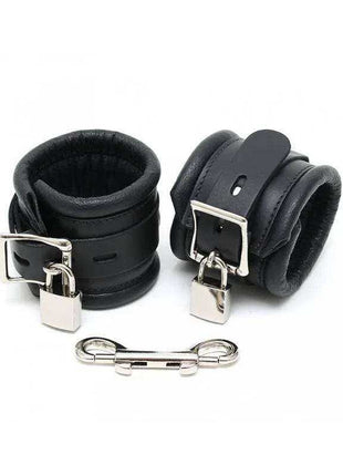 Hand Cuffs LUX 7 CM, black padded leather cuffs with silver buckles, padlocks and connecting bar