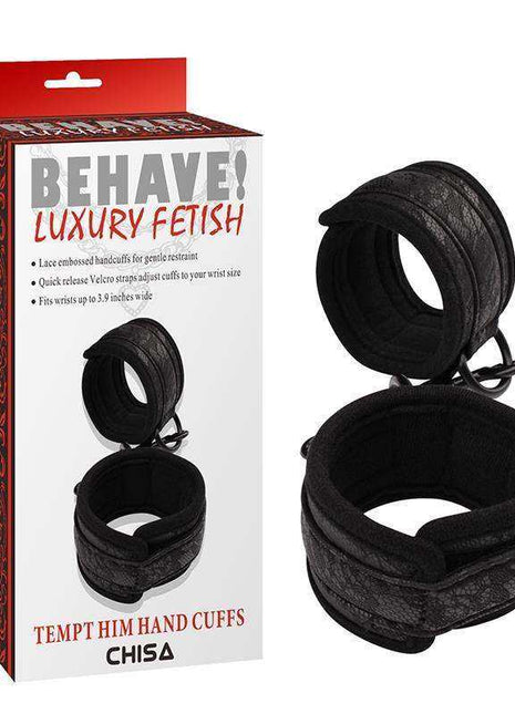 Hand Cuffs Tempt Him black padded wrist cuffs with textured straps and connecting rings, shown beside branded packaging