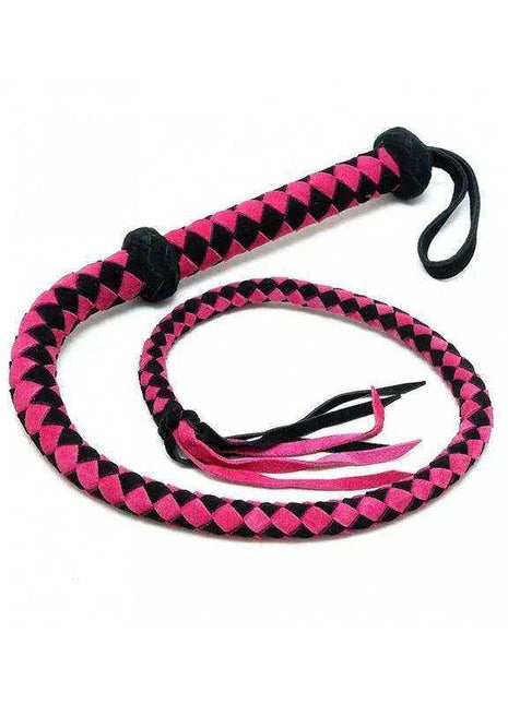 Handcrafted Leather Bullwhip with a vivid pink and black woven diamond pattern, black handle loop, and trailing tassels