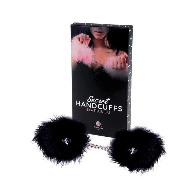 Black handcuffs adorned with soft marabou feathers for elegant intimate play