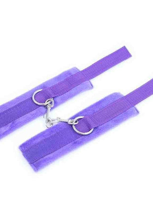 Handcuffs with Velcro Purple featuring two soft purple fabric wrist cuffs, adjustable hook-and-loop straps and metal rings