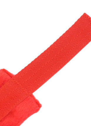 Red handcuffs with soft velcro fur lining for comfortable and secure wear