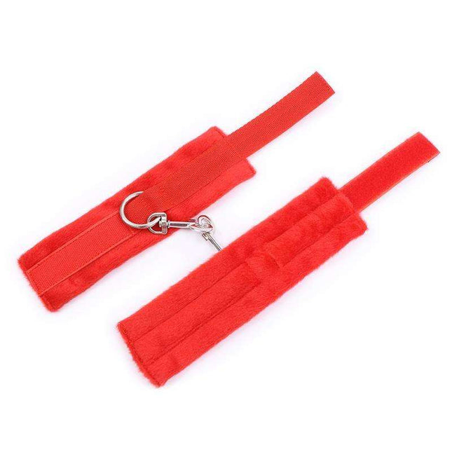 Red handcuffs with soft velcro fur lining for comfort and secure fit