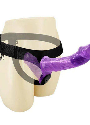 Harness Double Dildo in translucent purple silicone with a curved dual-ended shape and adjustable black harness straps