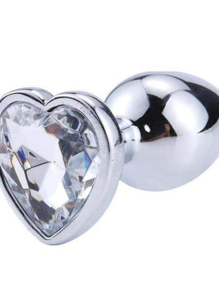 Heart Shaped Butt Plug with a polished silver-tone finish, clear faceted heart jewel base and rounded metal plug