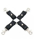 Hogtie 4 Hooks restraint connector with four black leather straps, silver-tone rivets and metal snap hooks.