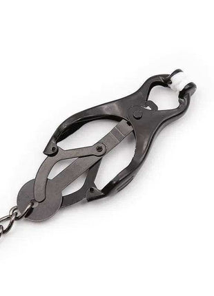Japanese Nipple Clamps in black metal with adjustable hinged arms, white padded tips and an attached chain