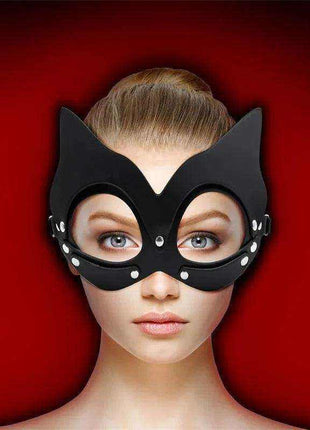 Kaissy Cat Mask Adjustable in black with pointed cat ears, eye openings, and small white dot accents