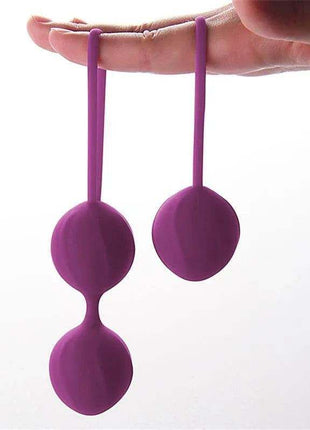 Purple silicone Kelly Kegel balls for pelvic floor strengthening