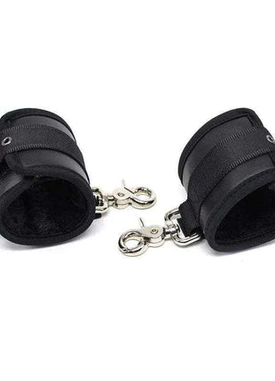 Leather Handcuffs with Big Hoops Black, featuring black padded cuffs, adjustable straps, and shiny metal rings and clips.
