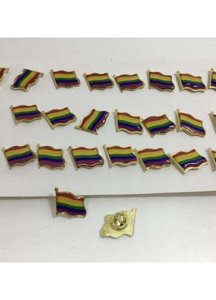 LGBT+ Pride Metal Pin featuring a small rainbow flag with multicoloured horizontal stripes and a gold-tone metal edge