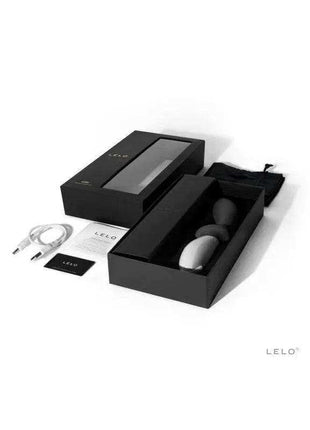LOKI Obsidian Black set with sleek black packaging, a white oval device, charging cable, and branded accessories.