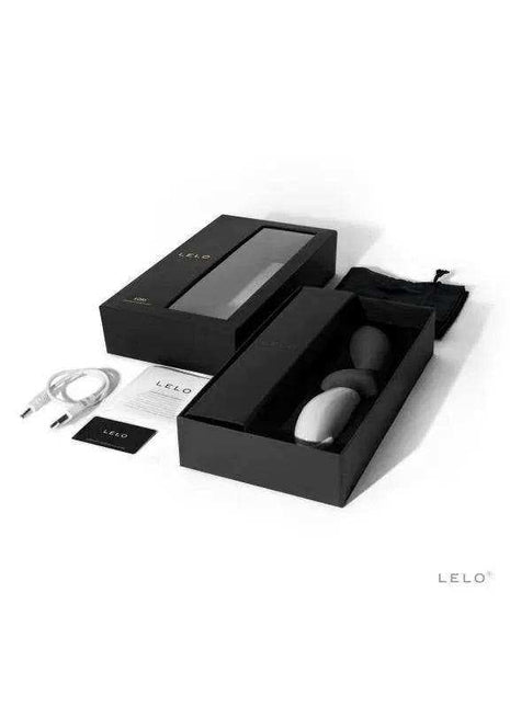 LOKI Obsidian Black set with sleek black packaging, a white oval device, charging cable, and branded accessories.