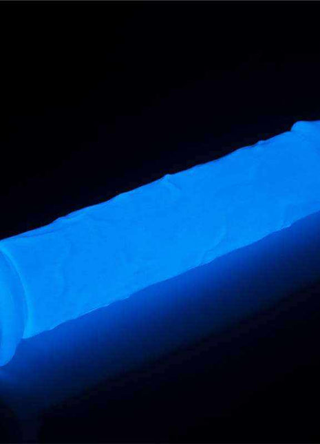 Dildo Lumino 8 Blue Light glowing vivid blue, with a smooth textured shaft and flared suction base
