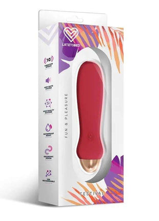 Luxo Stimulator in a smooth rust-red body, presented in white retail packaging with colourful abstract graphics.