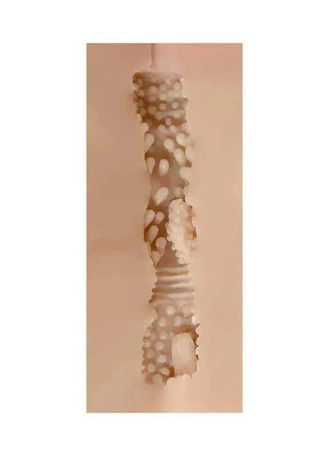 Male Masturbator Vainga in beige skin-like material with a long, textured internal canal featuring raised bumps and ridges