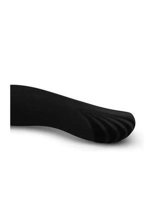 Massager No. 4 Black in smooth black material, with a curved handle and ridged rounded massage head