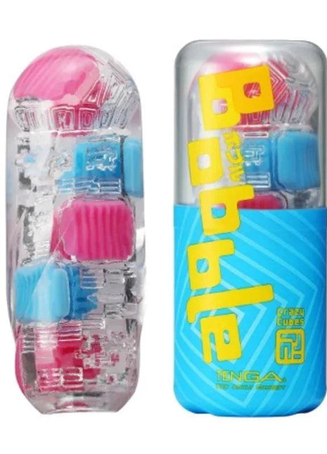 Masturbator Bobble Crazy Cubes in clear flexible elastomer with pink and blue cube textures, beside its blue and clear case