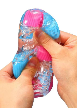 Masturbator Bobble Crazy Cubes flexible soft elastomer with textured cube interior in practical dust-proof case