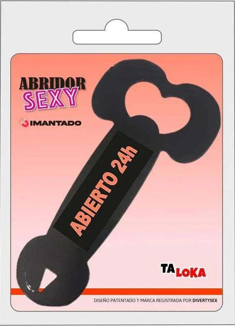 metal bottle opener in black metal with a pink heart-shaped handle and printed Spanish lettering, packaged as a novelty design