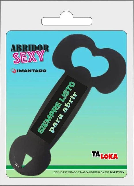 Metal bottle opener in matte black metal with a novelty penis-shaped handle and Spanish lettering