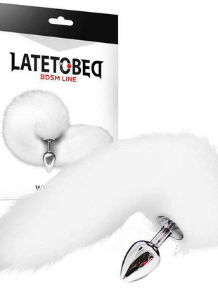 Metal Butt Plug with a polished silver finish and long, fluffy white tail attached to its rounded base