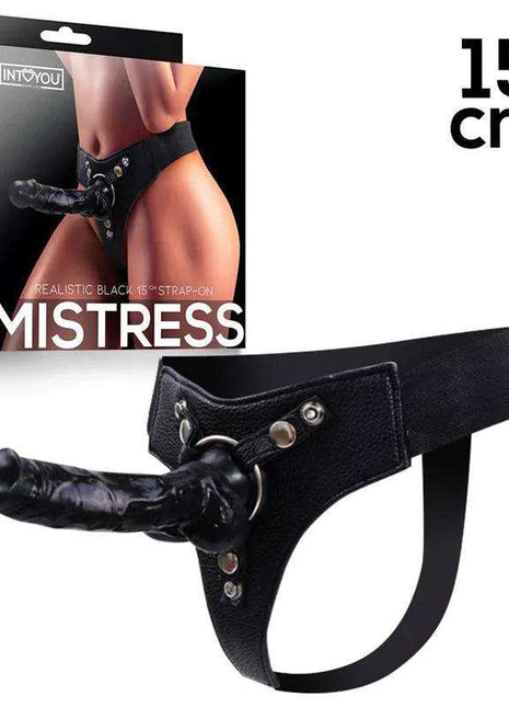 Mistress Elastic Strap-on with a black textured 15 cm dildo, adjustable elastic straps, and studded harness attachments