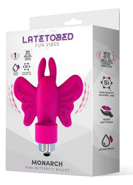 Monarch Butterfly Vibrating Bullet in bright pink silicone with a butterfly-shaped body and compact metallic base