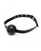 Mouthgag-Adjustable black ball gag with a perforated spherical mouthpiece and adjustable strap with metal buckle