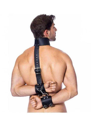 Neck and Hands Ties Leather in black with adjustable straps, metal buckles and rings linking a wide neck collar to wrist cuffs