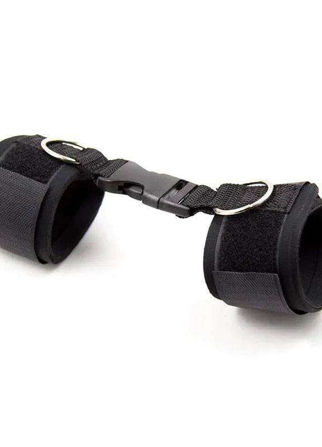 Black neoprene handcuffs with adjustable veldro straps