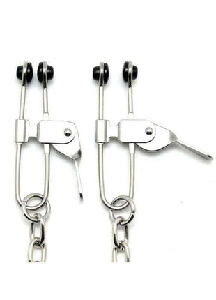 Nipple Clamps in polished silver metal with black tips, adjustable lever closures and dangling chain attachments