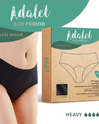 Ocean Menstrual Panty Heavy in black seamless fabric, shown as high-rise underwear with matching eco-friendly retail packaging.