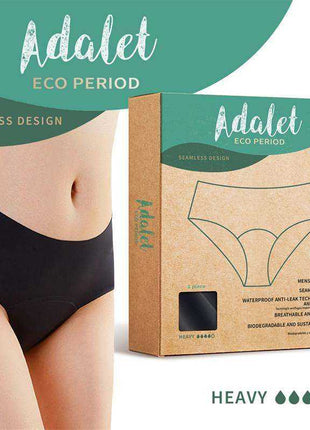 Ocean Menstrual Panty Heavy in black seamless fabric, shown as high-rise underwear with matching eco-friendly retail packaging.