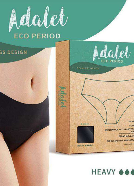 Ocean Menstrual Panty Heavy in black seamless fabric, shown as high-rise underwear with matching eco-friendly retail packaging.