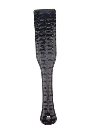Paddle Spank Me 32 cm, black textured paddle with a broad ridged striking surface and a narrow handle with metal stud