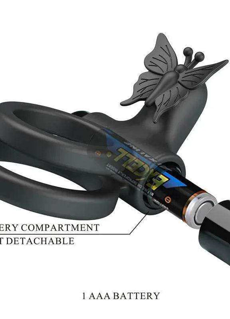 Penis Ring Passionate IX black silicone ring with a raised butterfly detail and attached cylindrical vibrating unit