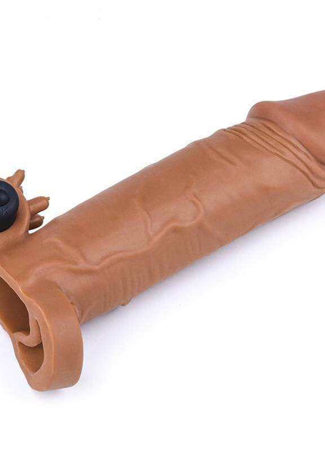 Penis Sleeve with Vibration in tender brown TPE, with realistic ridged texture, an open base ring and black vibrating bullet